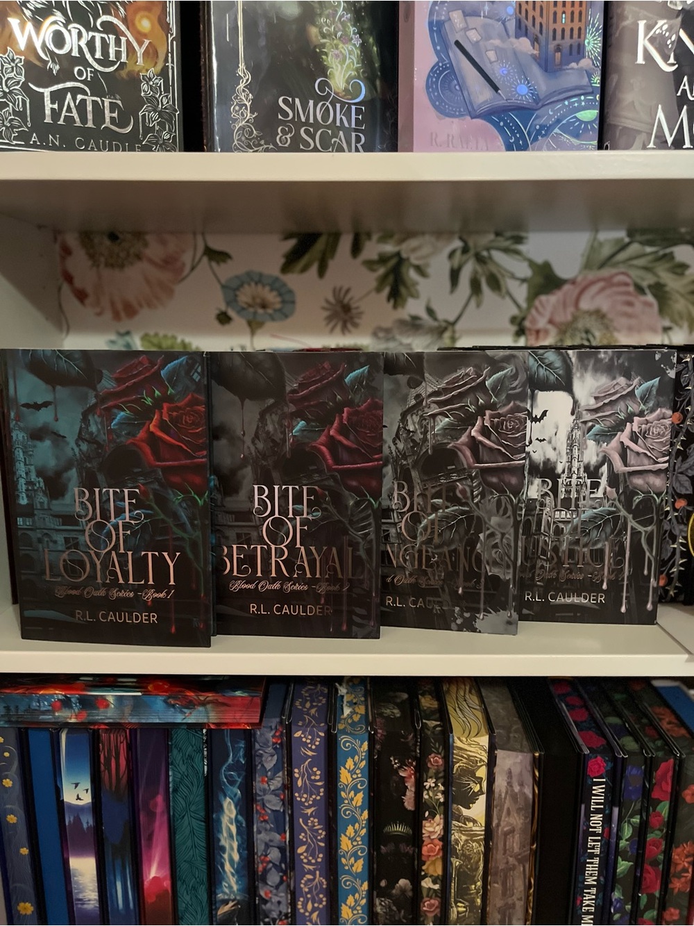 Bite of Betrayal by R.L. Caulder - Dark Teal & Red Hardcover Fantasy